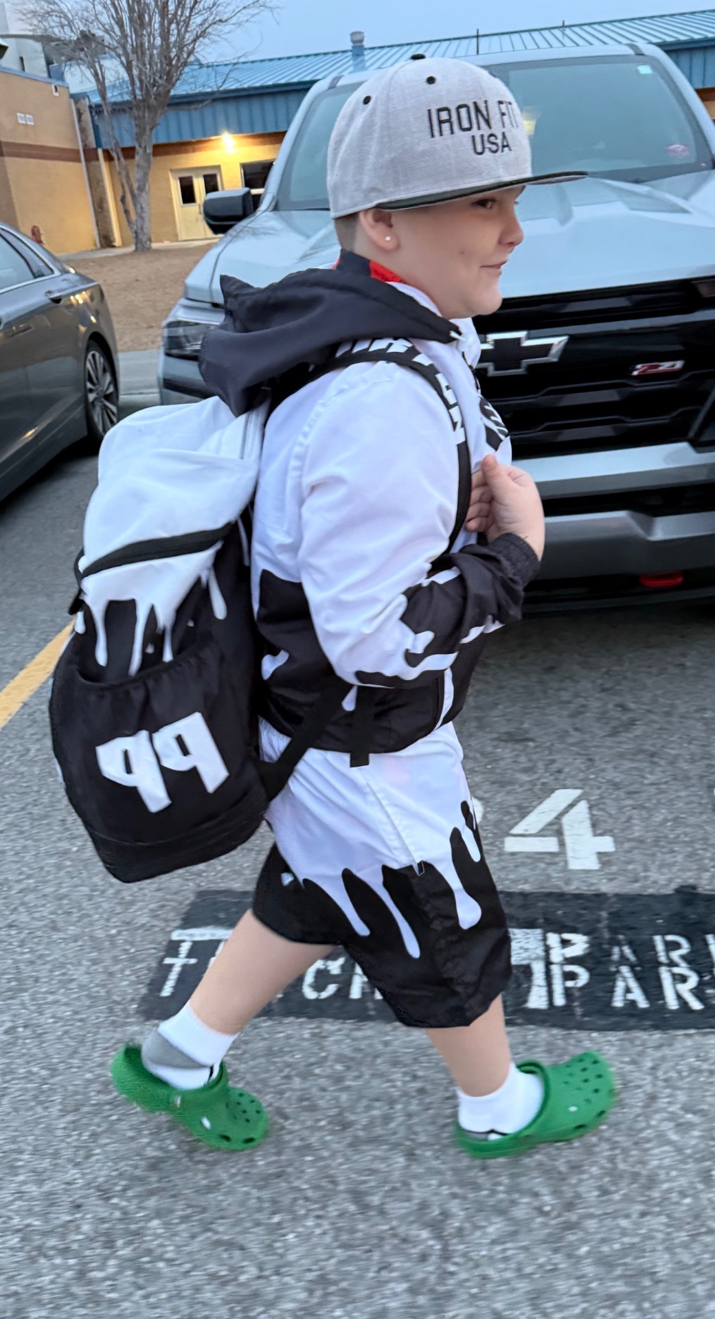 Young fan in a full IF Gameday set